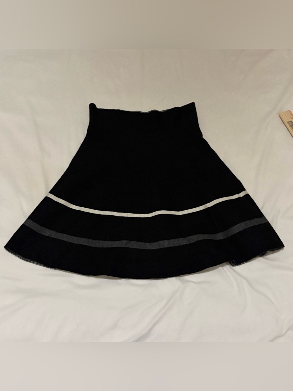 Black Circle Skirt with Contrasting White and Gray Stripes